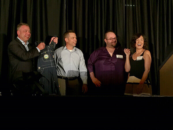 The Marczyk Fine Foods team accepting their Honorary Farmer of the Year award in Iowa.