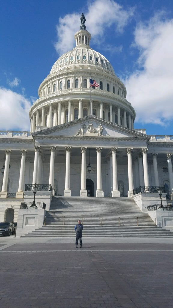 Ron Mardesen in front of U.S. Capitol Building for antibiotic resistance event with Pew